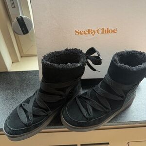 See by Chloe Black tie boots. Elevated Ugg Style